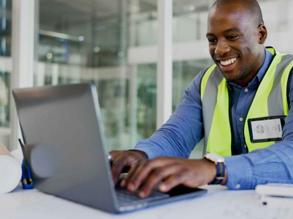 construction worker on computer