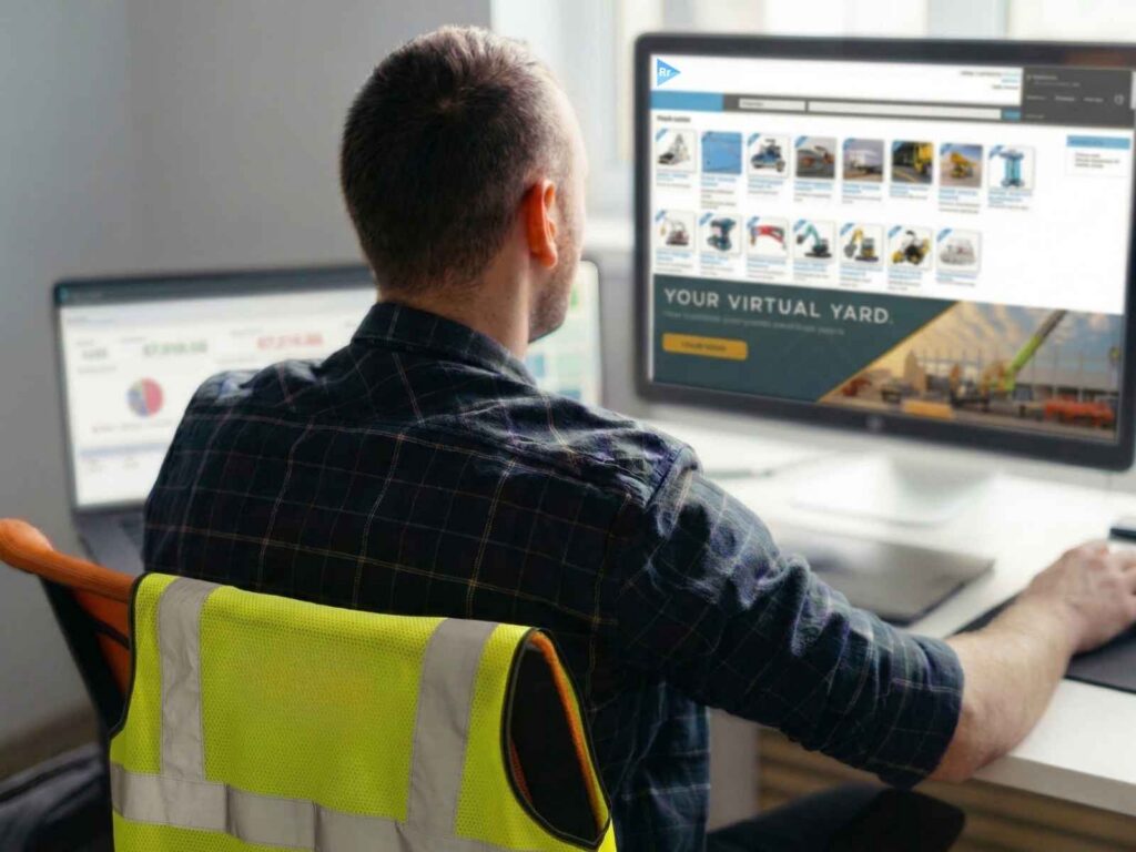 construction worker on commuter in an office