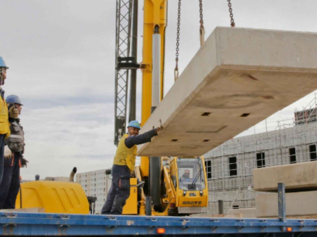 crane lifting cement block