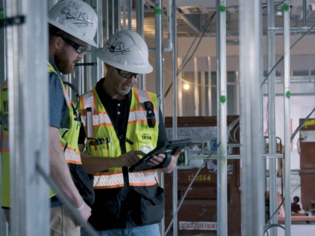 Integrations (36) construction workers on tablet