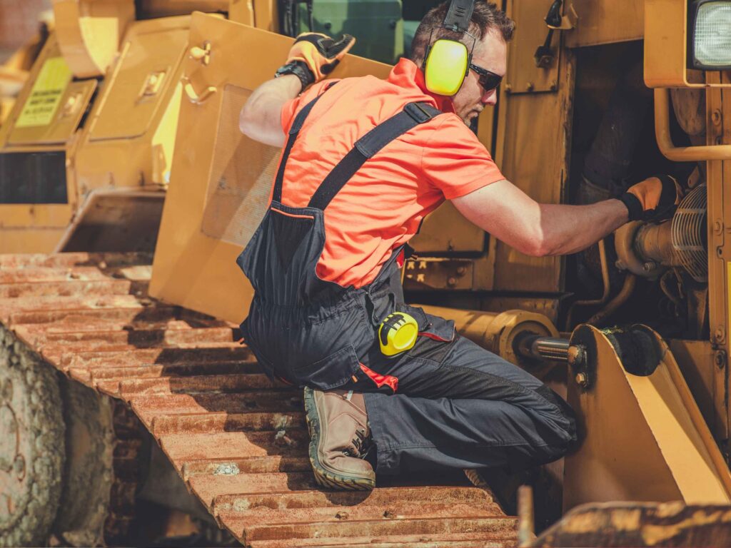 GO (14) Heavy Equipment Mechanic Working on Vehicle