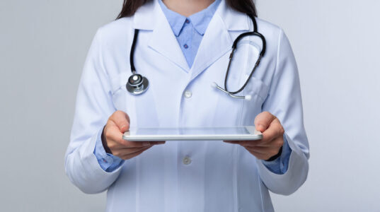 nurse with tablet