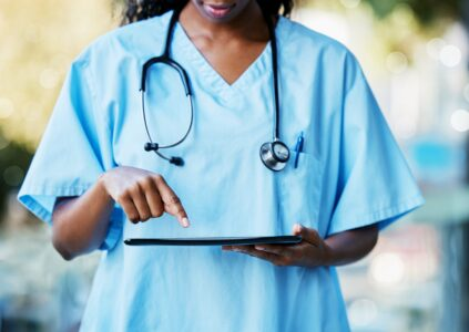 nurse on tablet